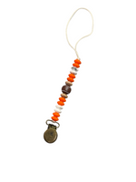 Load image into Gallery viewer, Petite Football Pacifier Clip - Food Grade BPA Free Silicone
